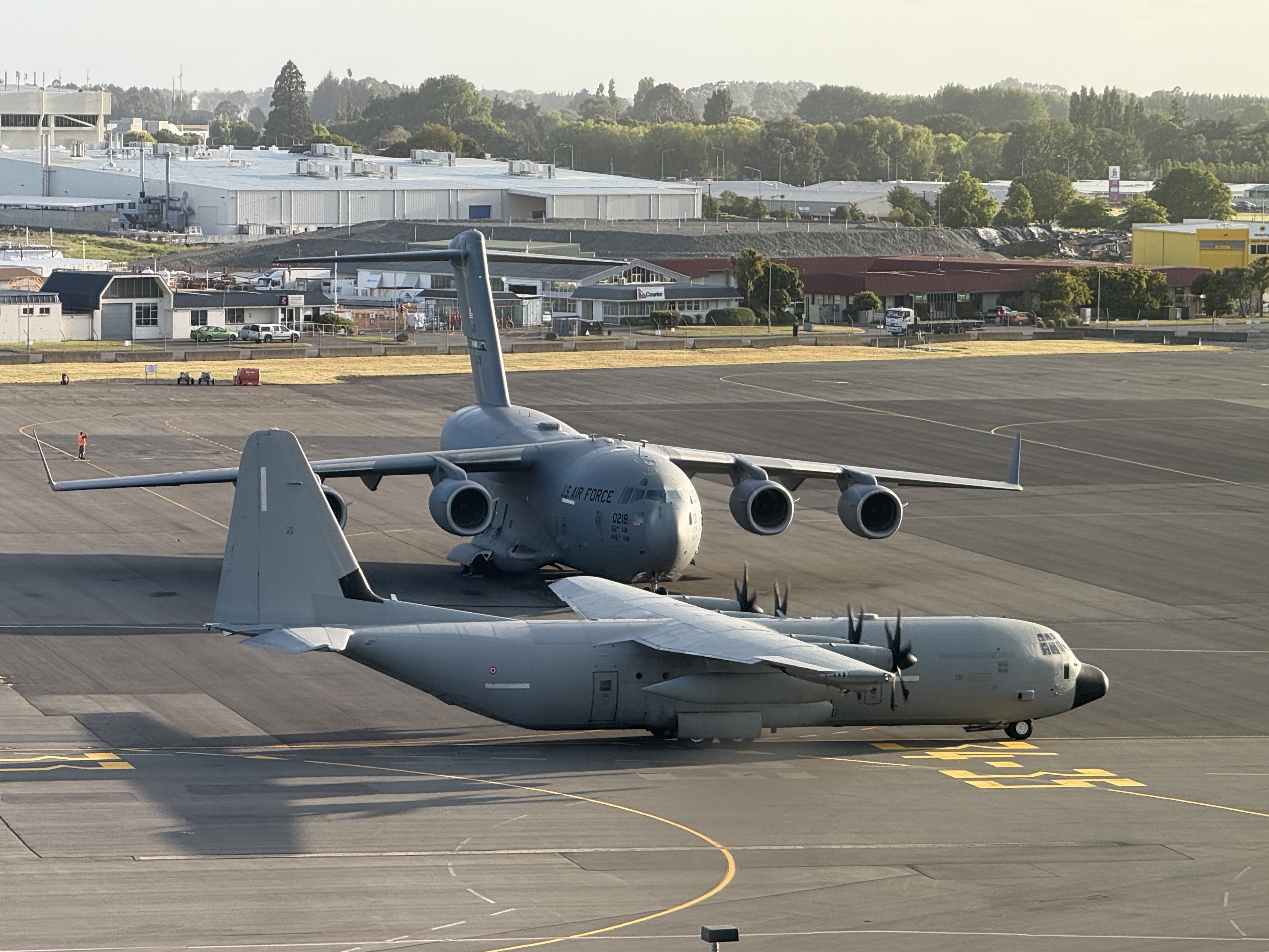 Lockheed Martin (C-130), Boeing (C-17) C-130 Hercules (foreground), C-17 Globemaster III (background)